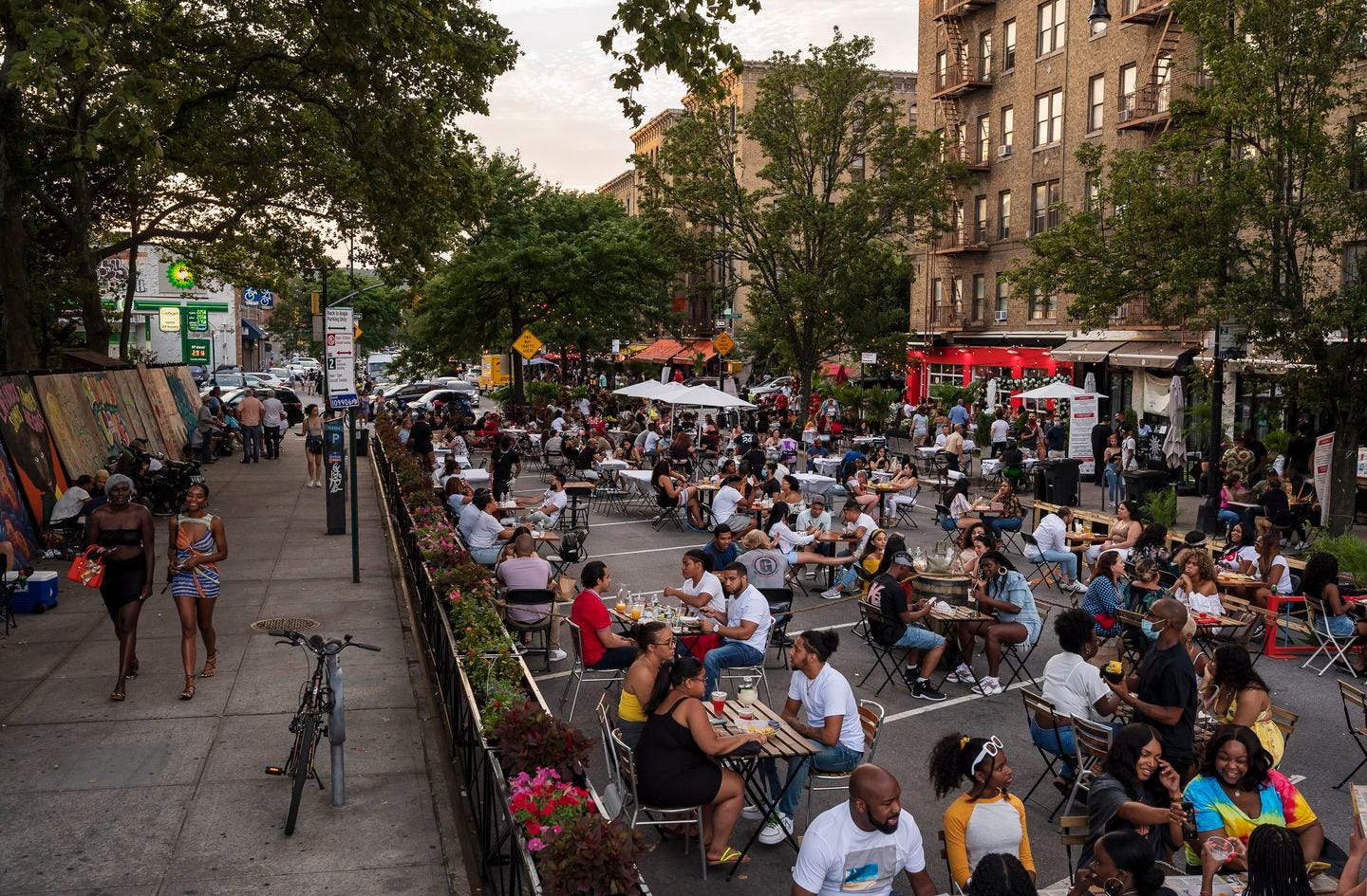 Restaurants have taken over Dyckman Street in northern Manhattan, which has been temporarily closed to cars during the coronavirus pandemic.