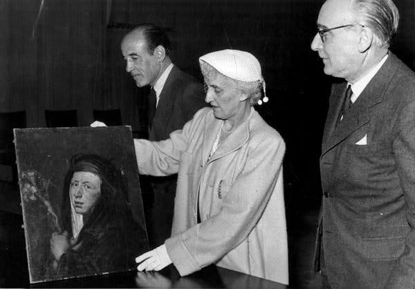 Ardelia Ripley Hall returning a portrait of St. Catherine by Rubens to Germany in 1952.