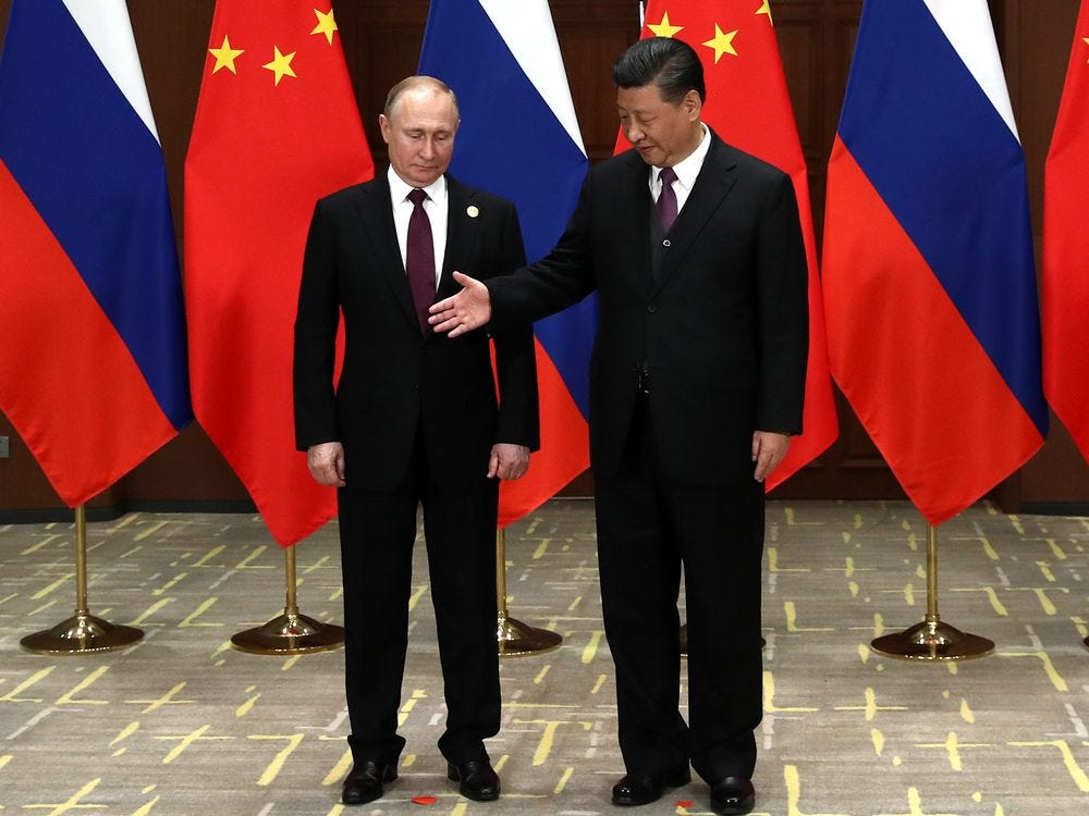 Vladimir Putin and Xi Jinping on April 26.
