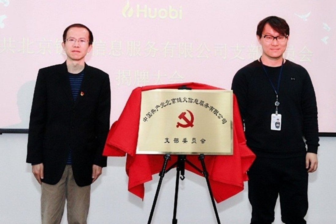 Huobi founder Li Lin (right) and Communist Party official Cao Zhou at the ceremony to establish a party committee within the cryptocurrency exchange. Photo: Weibo