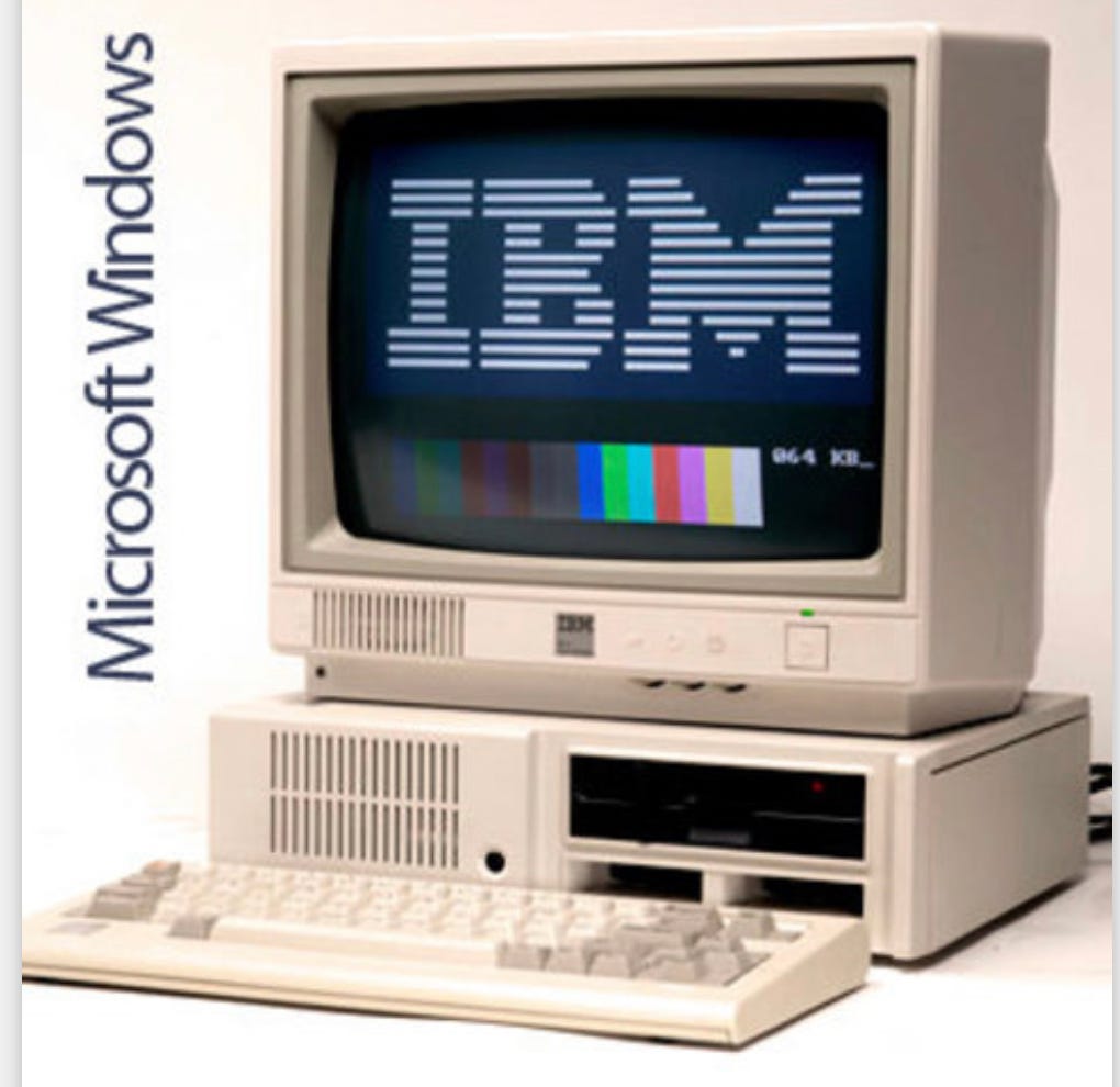 photograph of an ibm pc from 1985 running windows 1.0