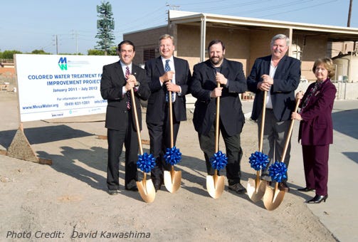 Clueless directors accidentally use shovels to point to exact location of new water treatment facility. Photo from Mesa Water website.