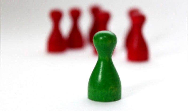 Green pawn separated from group of red pawns