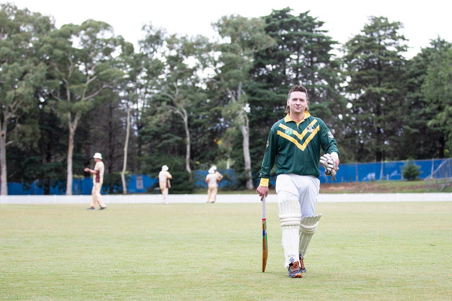 May be an image of Jackson Gothe-Snape, standing, playing a sport, grass and text