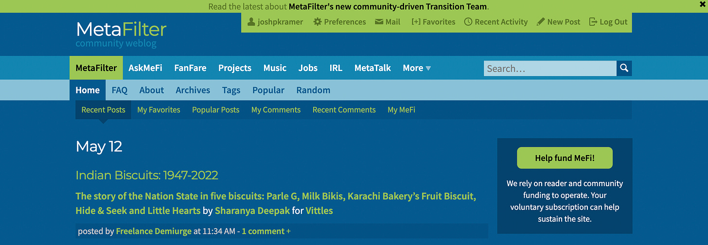 A screenshot of the main page of MetaFilter, with blue background and lime green accents.