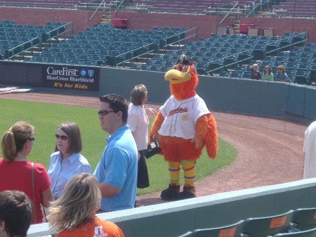 Sherman gets a greeting from Salisbury Mayor Barrie Tilghman.