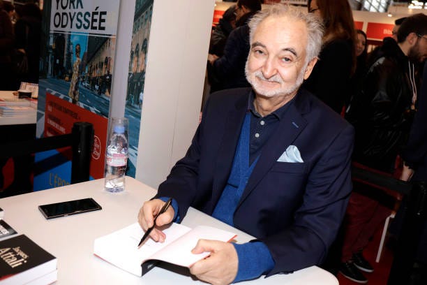 Economist, Writer and senior French official Jacques Attali poses during Paris Book Fair 2018 at Parc Des Expositions Porte de Versailles, France on .