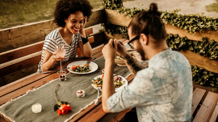 Man and woman on a dinner date — This Is Why Vegans Have Better Sex