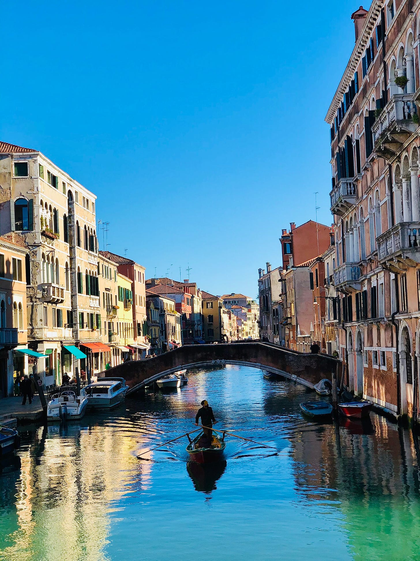 A canal in Venice, Italy lined with buildings typical of Venice architecture.