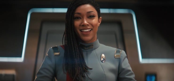 Captain Michael Burnham (Sonequa Martin-Green) in the gorgeous new grey uniform with command red stripe in the captain's chair