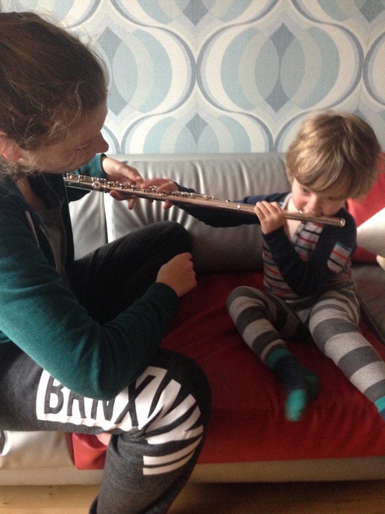Milo tries the flute