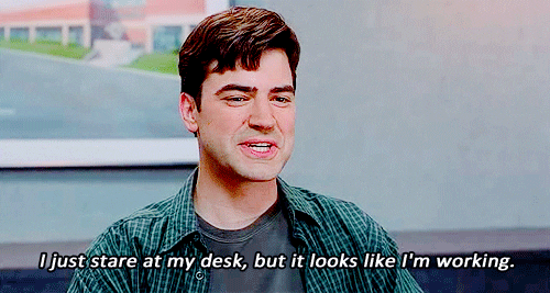 Peter Gibbons from the movie Office Space saying, "I just stare at my desk, but it looks like I'm working