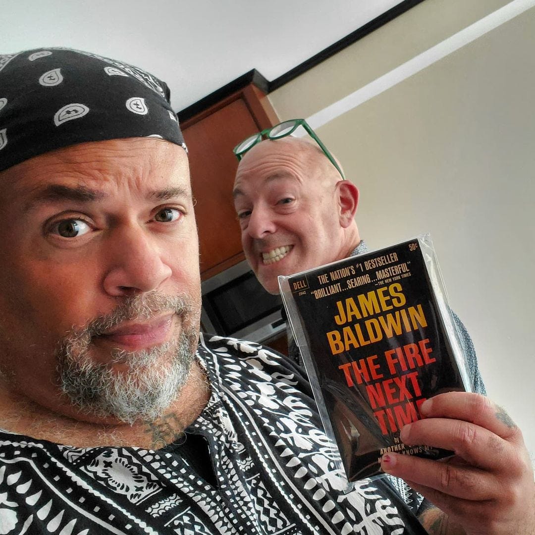 May be an image of 2 people, beard and book