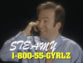 A gif of actor Bob Odenkirk dressed in a office wear is lying on the ground with a phone while the number 1-800-55-GYRLZ is shown along with the flashing words of sexy, phone, and steamy