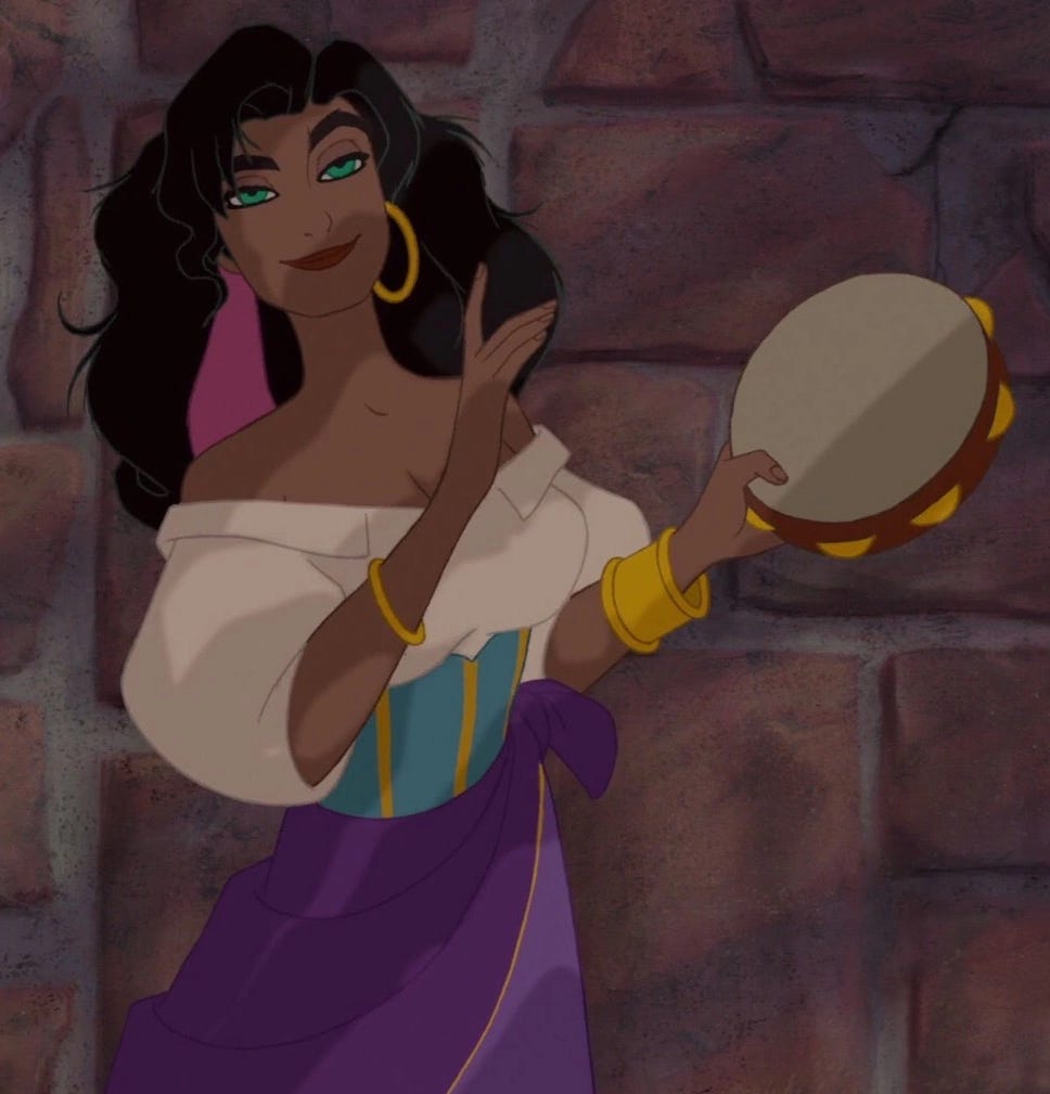 Esmerelda Playing a tambourine.