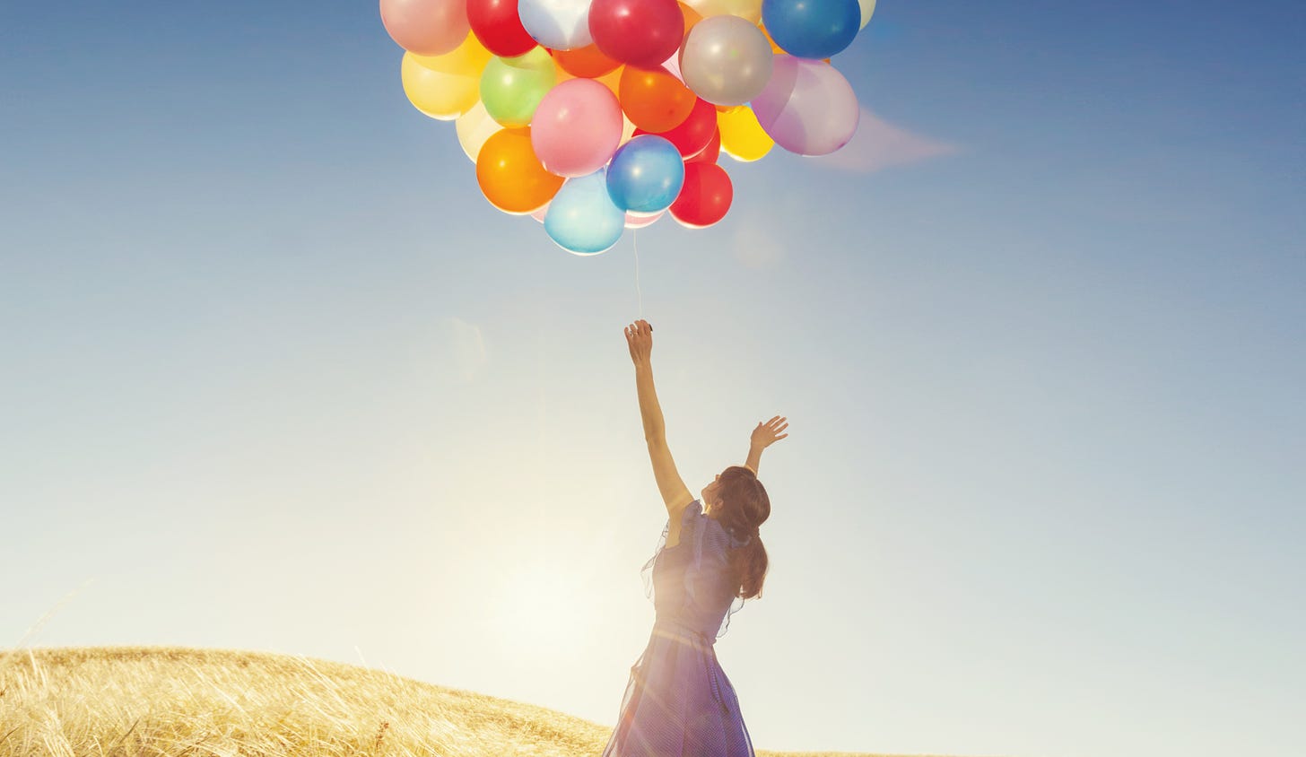 beautiful girl with colorful balloons outside. – Divinely Different