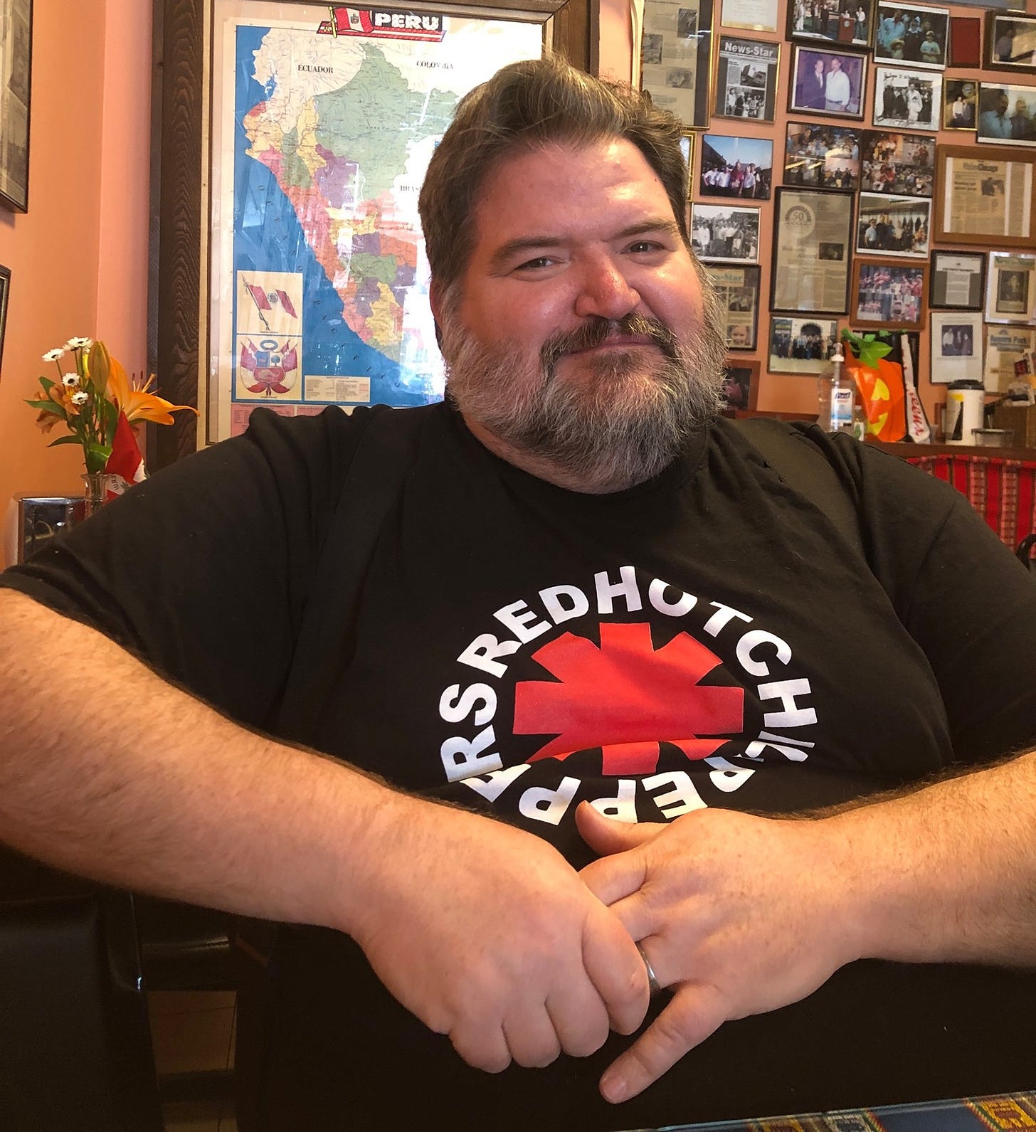 Picture of Jeremy D. Nichols, wearing a black Red Hot Chili Peppers shirt.