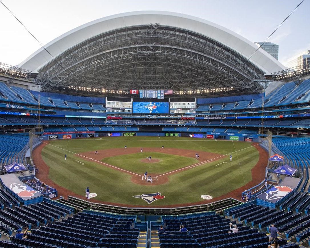 The Toronto Blue Jays play an MLB intrasquad baseball game in a nearly empty Rogers Centre in Toronto on Thursday, July 9, 2020. Rogers Communications Inc. says it was exploring the future of its Toronto stadium prior to the COVID-19 pandemic, but now the virus has caused it to de-prioritize the matter.