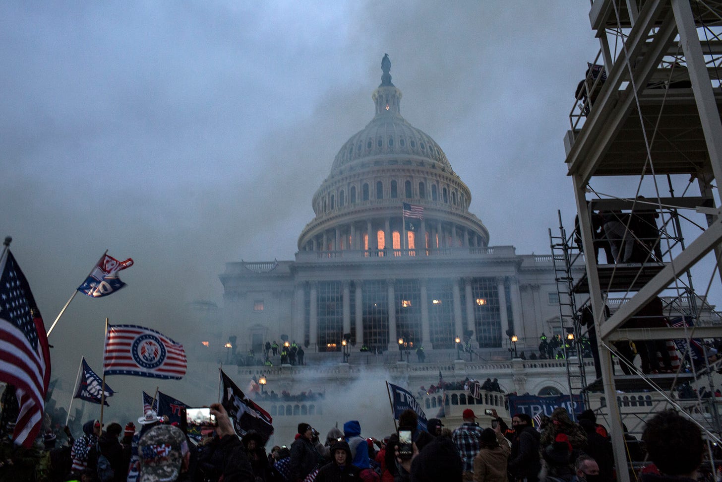 : Security forces respond with tear gas after the US President Donald Trump's supporters breached the US Capitol security. Pro-Trump rioters stormed the US Capitol as lawmakers were set to sign off Wednesday on President-elect Joe Biden's electoral victory in what was supposed to be a routine process headed to Inauguration Day. (Photo by Probal Rashid/LightRocket via Getty Images)