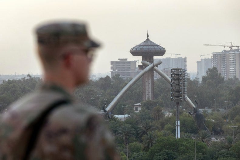 A U.S. Army soldier looks onto Baghdad 