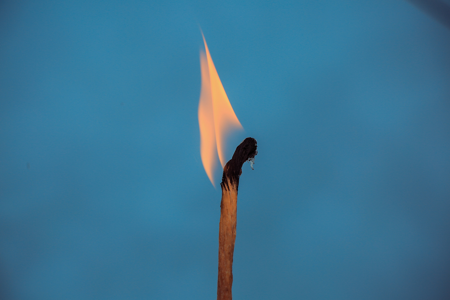 image of a burning match