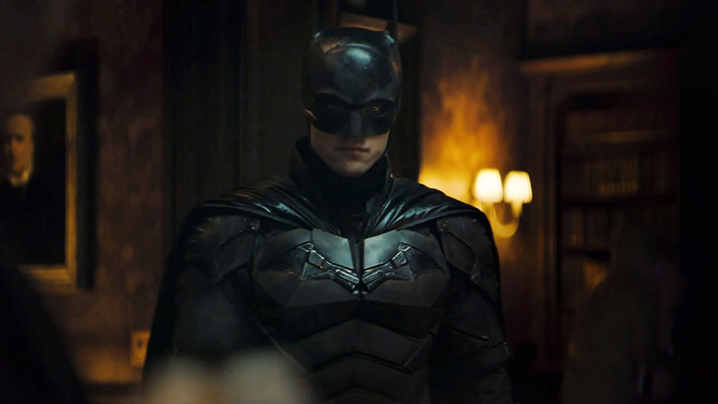 Batman glaring at the camera in his full costume.