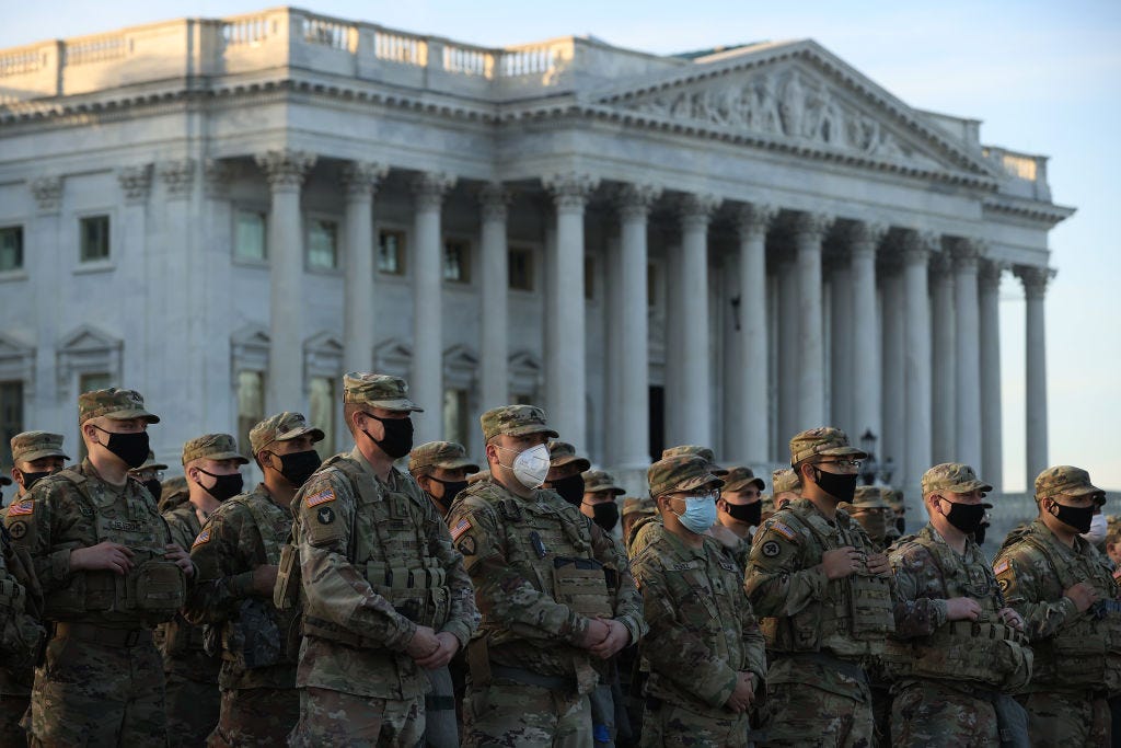 National Guard troops on the East Front of the U.S. Capitol on Thursday. (Chip Somodevilla / Getty Images)