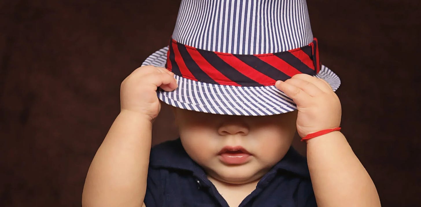 black and white stripes fedora hat on a chubby baby