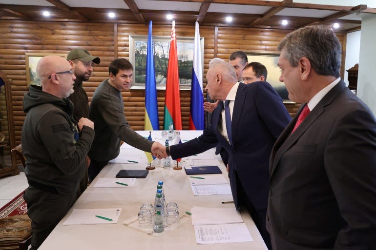 Russian and Ukrainian officials take part in the talks in the Brest region, Belarus