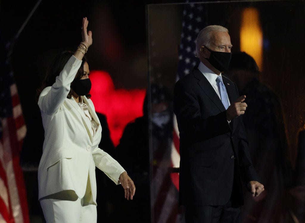 President-elect Joe Biden and Vice President-elect Kamala Harris take the stage at the Chase Center to address the nation Saturday in Wilmington, Delaware. (Win McNamee / Getty Images)