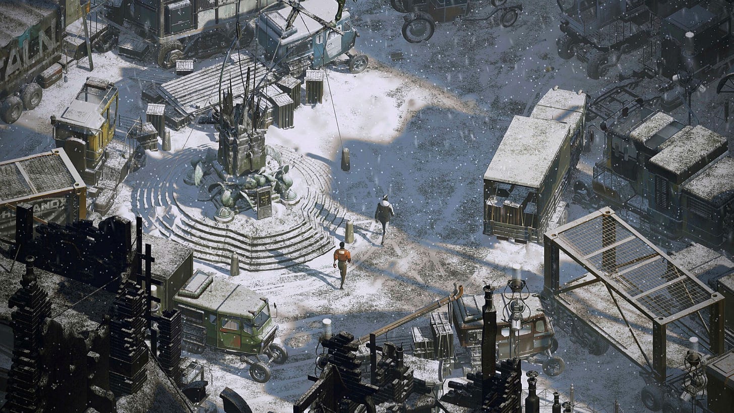 Screenshot from the game, showing an elevated view of a snow covered town square, surrounded by machinery and mechanical vehicles. Two characters walk across the square.