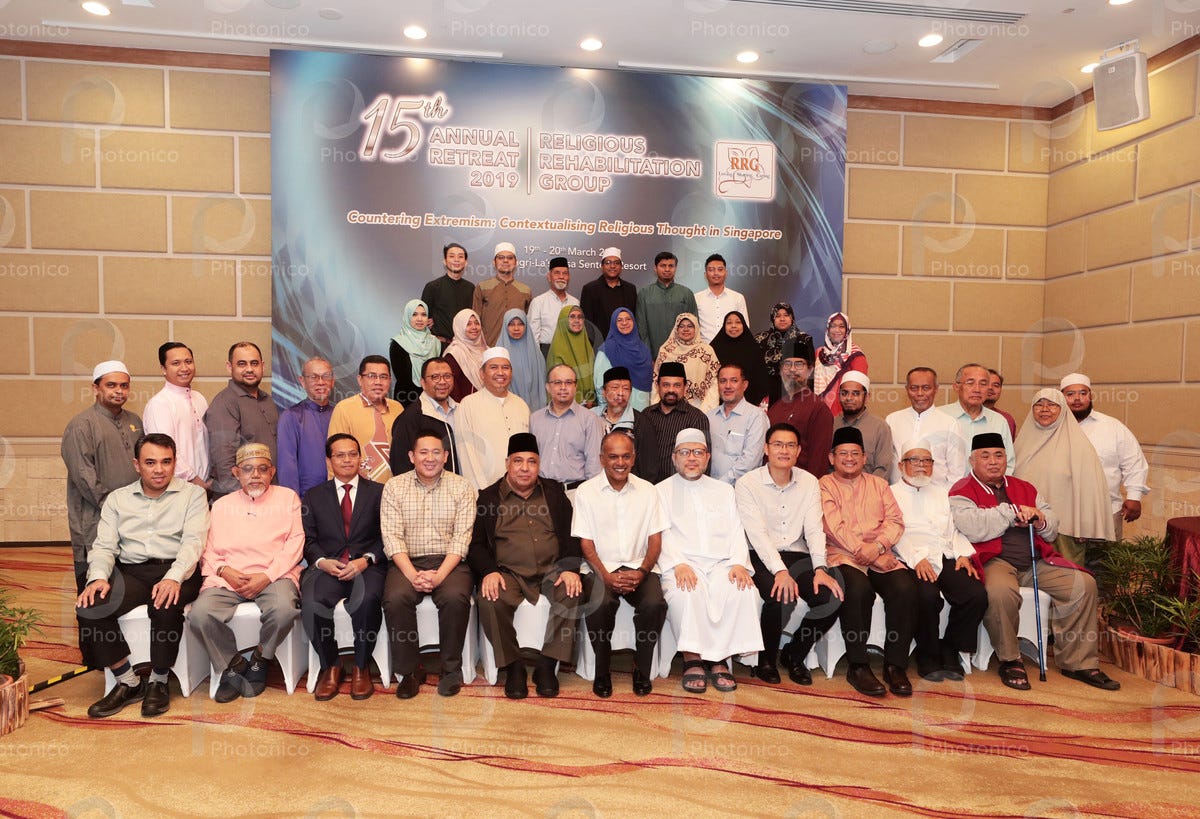 Group photo of the members of Religious Rehabilitation Group (RRG) for  RRG&amp;#39;s 15th Annual Retreat Lunch with Guest-of-Honour, Mr K. Shanmugam  (seated, centre), Minister for Home Affairs and Minister for Law, on