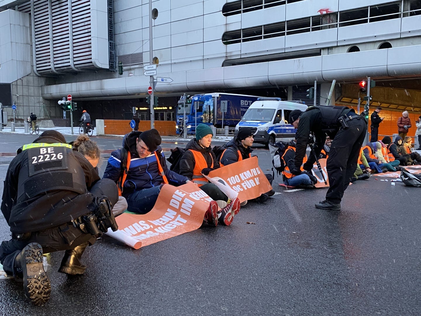 Climate activists from the group Letzte Generation (Last Generation) hold up commuter traffic on a Monday morning in Berlin by supergluing themselves to the road. Police unstick their hands using cooking oil and a pastry brush while irate drivers look on, stuck for more than an hour.