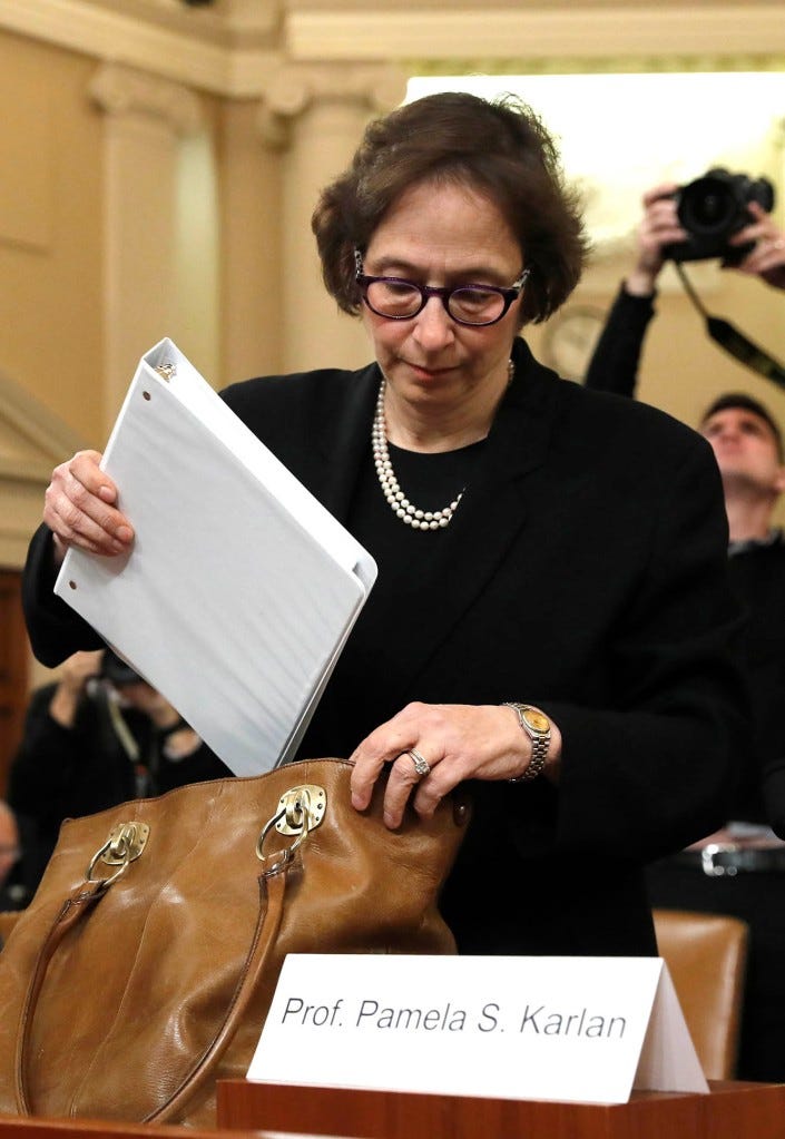 Constitutional law experts, from left, Harvard Law School professor Noah Feldman and Stanford Law School professor Pamela Karlan, arrive to testify during a hearing before the House Judiciary Committee on the constitutional grounds for the impeachment of President Donald Trump, Wednesday, Dec. 4, 2019, on Capitol Hill in Washington.