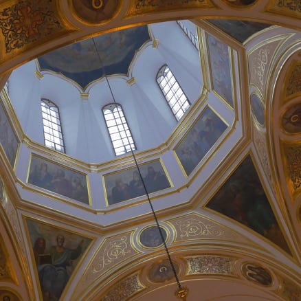 a-high-dome-ceiling-and-a-golden-chandelier-inside-of-a-magnificent-christian-orthodox-church-with-a-lot-of-prayin-people_rxzkvn_wl_thumbnail-full01