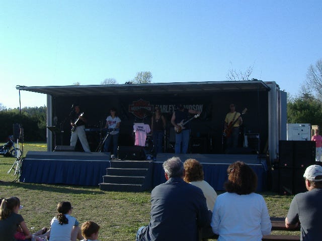 Couch Potatoes was the first band to play. I didn't catch a lot of their show because I was in rib lines, but what I did hear was your garden-variety classic rock covers.