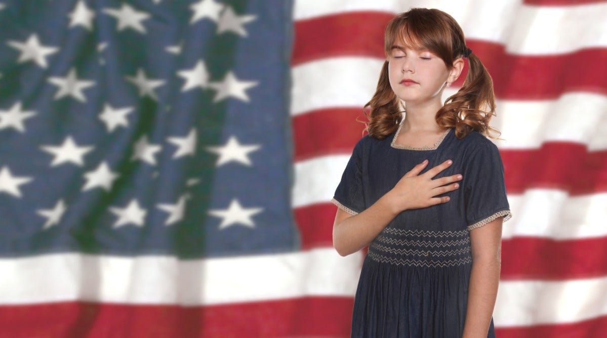The Pledge of Allegiance may not have been written by Francis Bellamy | A child recites the Pledge