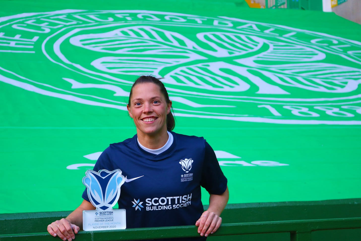 Lisa Robertson accepting her award at Celtic Park