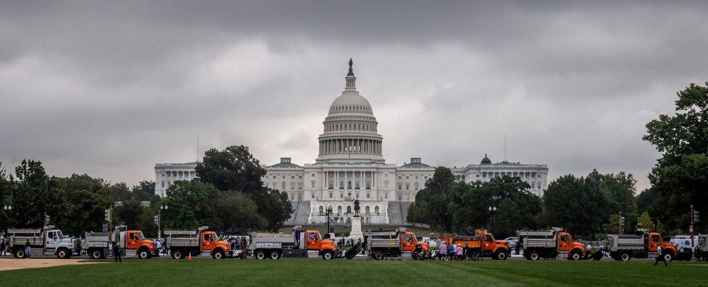A row of dump trucks was parked bumper to bumper as part of the enhanced security around the Capitol.