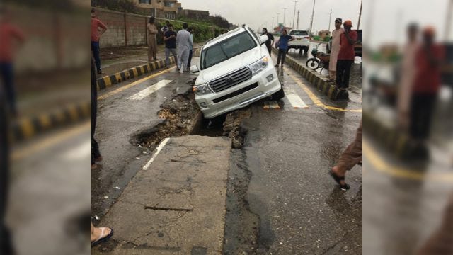SAMAA - DHA Karachi stormwater concrete slab drains buckle in ...