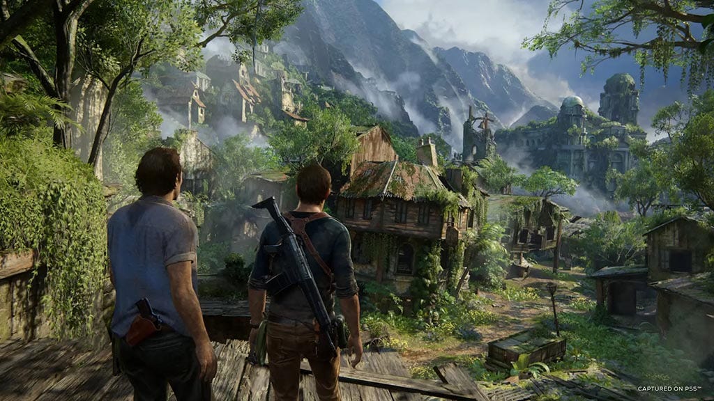 Nathan and Sam Drake looking at a ruined house in Uncharted: Legacy of Thieves Collection