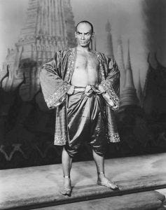 Photo of Yul Brynner on the set of "The King and I."