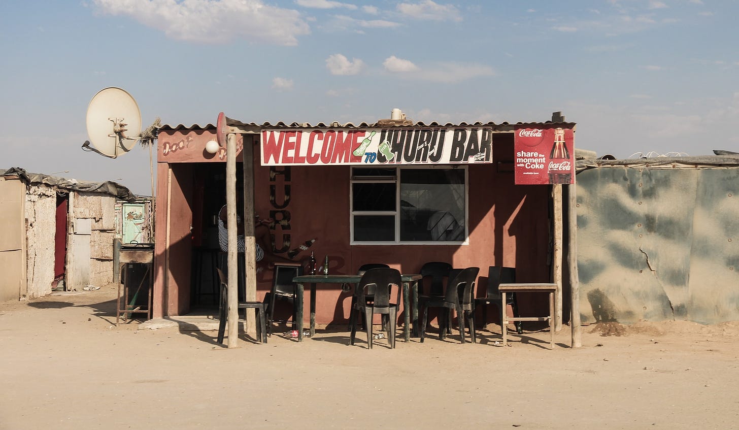 I was on a tour at the informal settlements in Swakopmund, Namibia. The centralization brings people from the rural to the city, but left many without houses. The people at the township are very happy with their lives tho. They like the style of walking around the mingling with others.