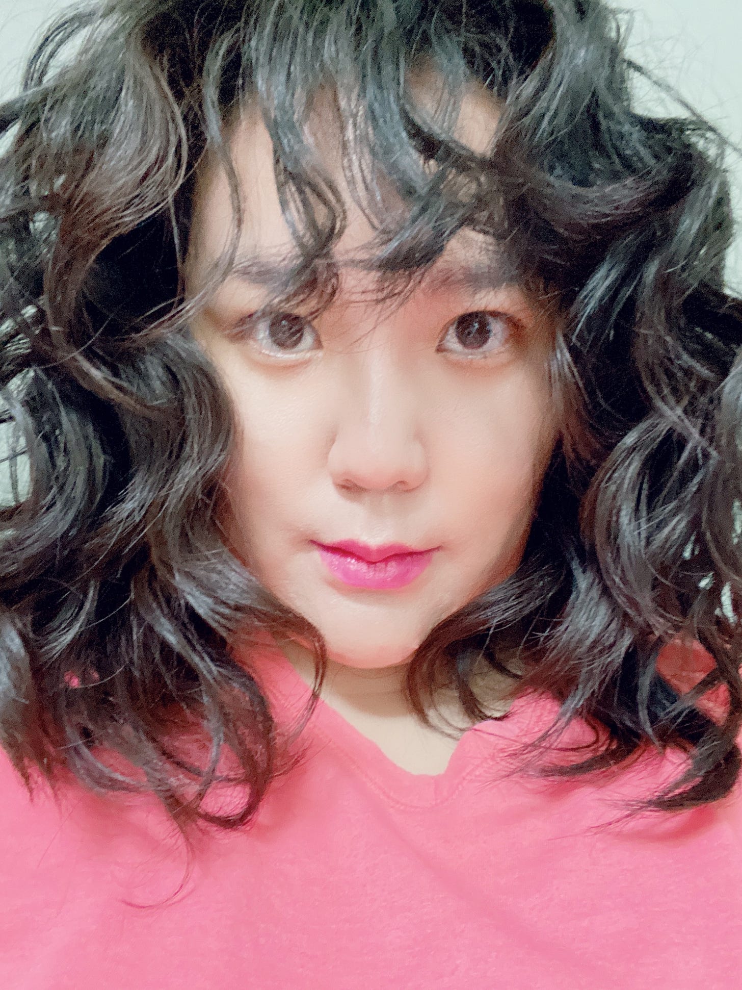 Selfie of a 36-year-old with a wolf-cut hairstyle