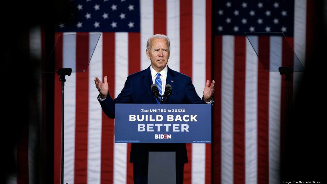 Biden at podium with Build Back Better sign