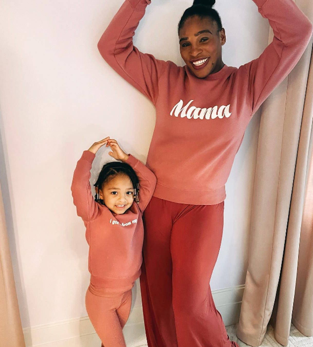 Serena Williams and her daughter, Olympia, wearing matching pajamas.