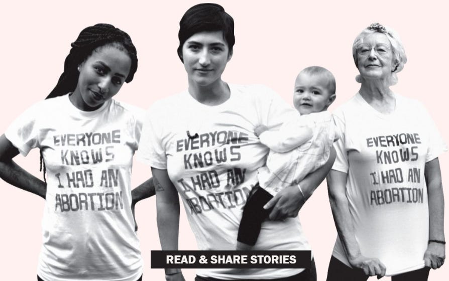 Women wearing shirts that say Everyone knows I had an abortion