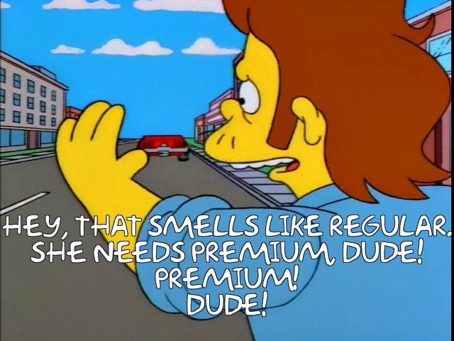 Snake from The Simpsons yelling that his car needs Premium gas.