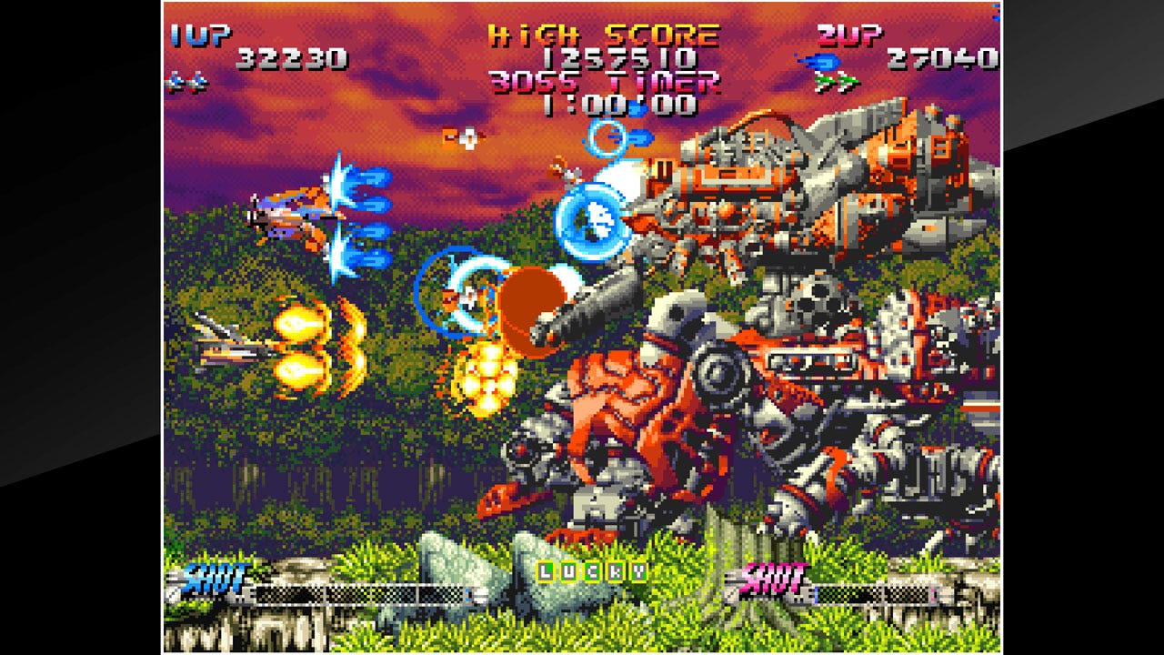 An early game boss from Blazing Star, facing off against a pair of ships in the games two-player mode.