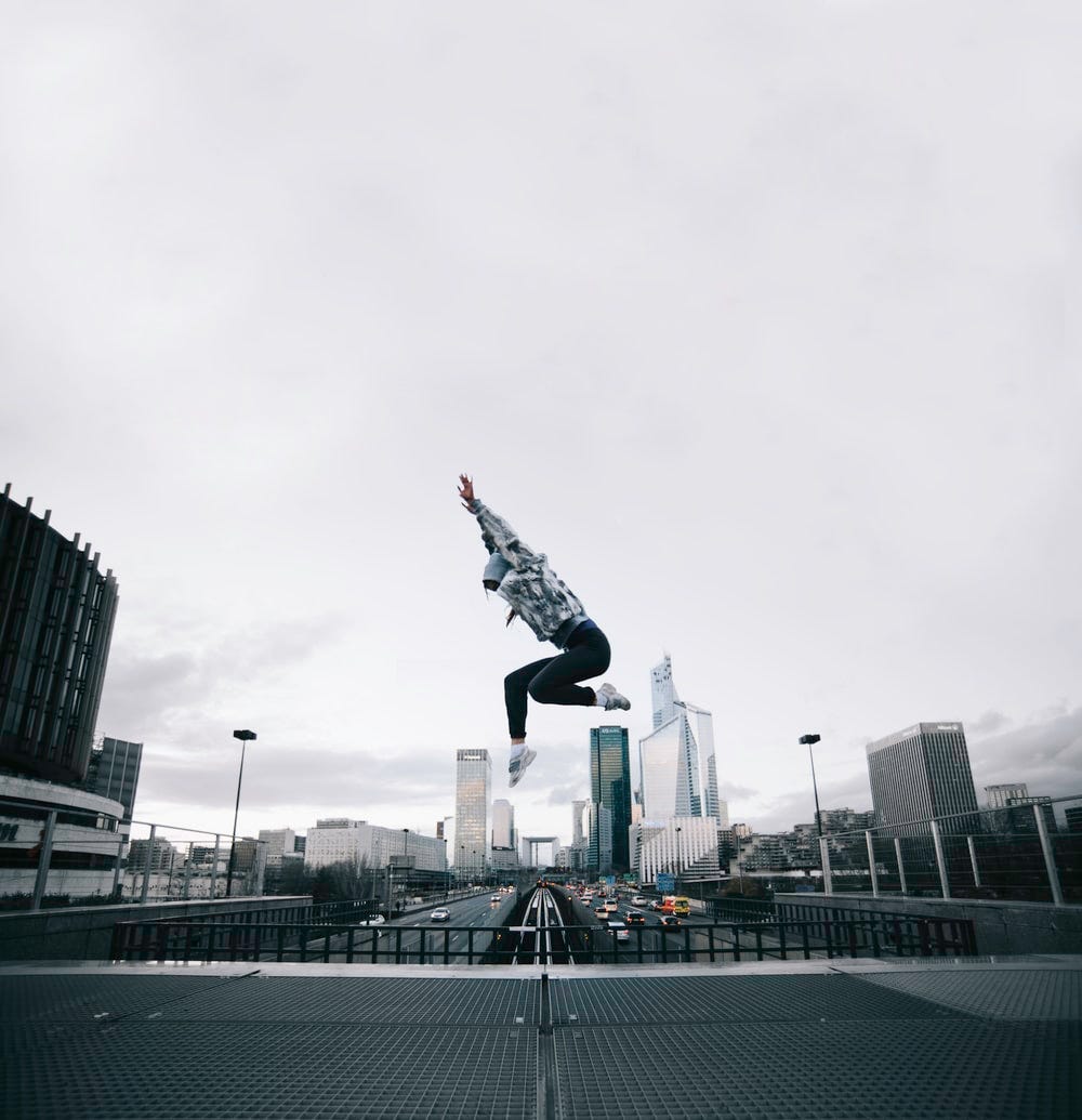 person taking a jump shot photo